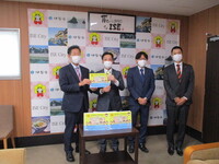 写真：会場での記念撮影の様子