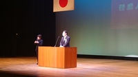 写真:会場での挨拶の様子