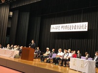 写真:会場での挨拶の様子
