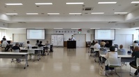 写真:会場での挨拶の様子