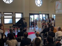 写真:会場での挨拶の様子