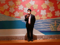 写真:会場での挨拶の様子