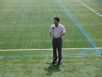 写真:会場での挨拶の様子