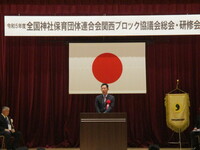 写真:会場での挨拶の様子