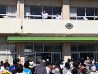写真:会場での挨拶の様子