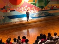 写真:会場での挨拶の様子