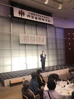 写真:会場での挨拶の様子