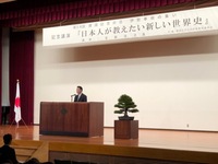 写真:会場での挨拶の様子