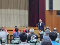 写真:会場での挨拶の様子