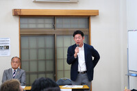 写真:会場での挨拶の様子
