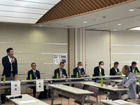 写真:会場での挨拶の様子