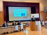 写真:会場での挨拶の様子