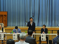 写真:会場での挨拶の様子