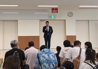 写真:会場での挨拶の様子