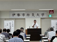 写真:会場での挨拶の様子