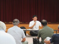 写真：会場での挨拶の様子