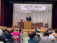写真:会場での挨拶の様子