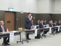 写真:会場での挨拶の様子