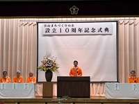 写真:会場での挨拶の様子