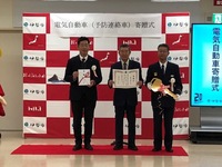 写真:会場での記念撮影の様子