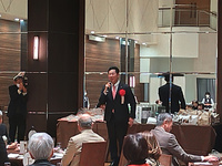 写真:会場での挨拶の様子