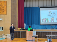 写真:会場での挨拶の様子